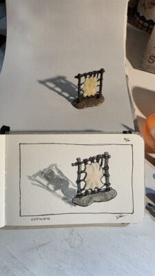 miniature deer hide tanning rack and an ink and watercolor wash sketch