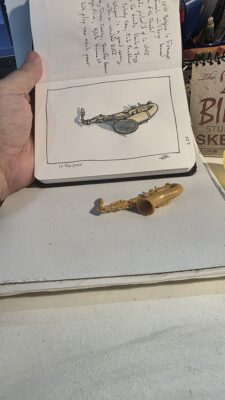 Mini saxophone model from Safari Ltd. and an ink and watercolor wash
