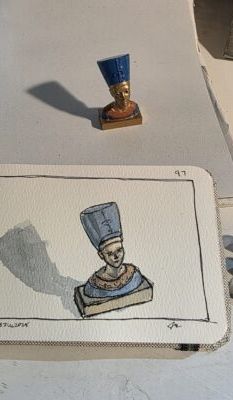 Miniature bust of Queen Nefertiti and an ink and wash illustration 
